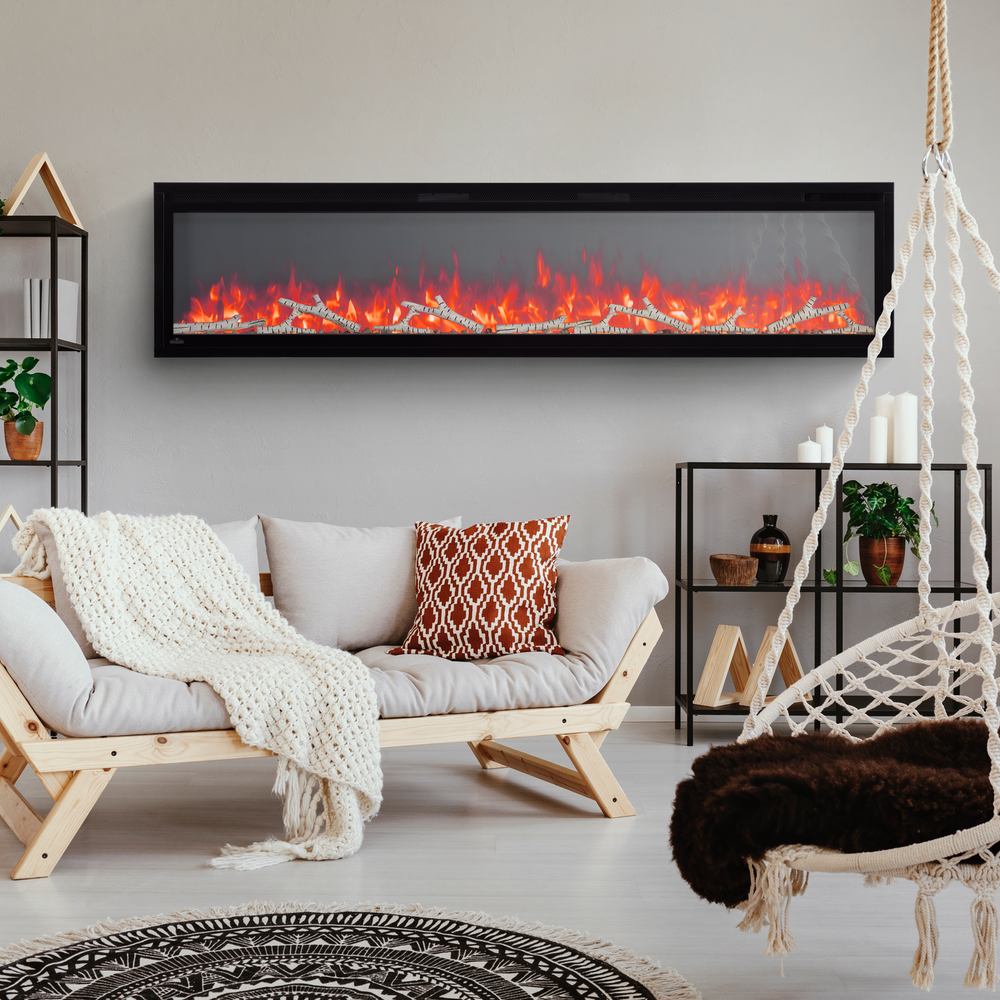 Living room with a fireplace, sofa, and hanging chair.