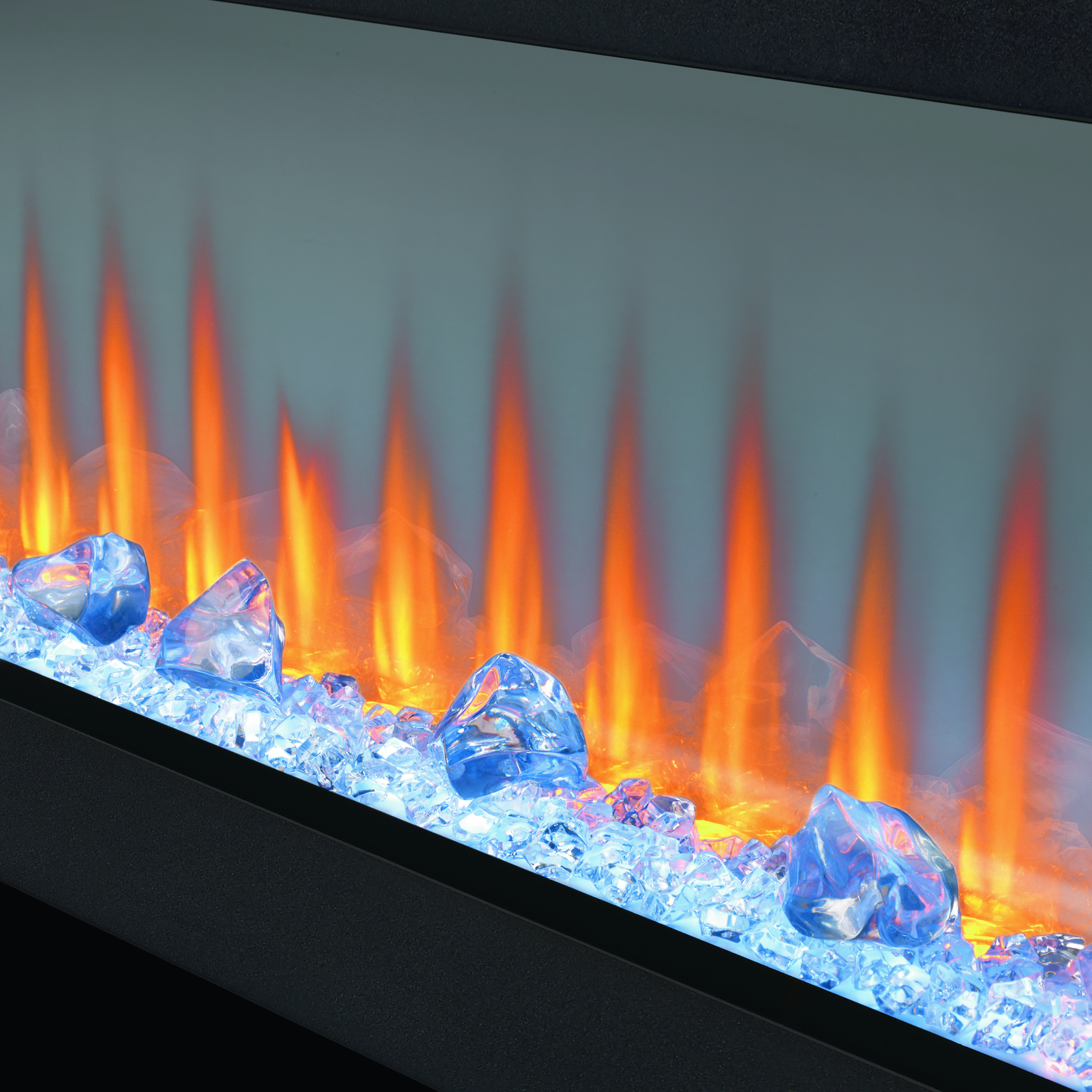 Electric fireplace with flames and blue crystals on a gray background