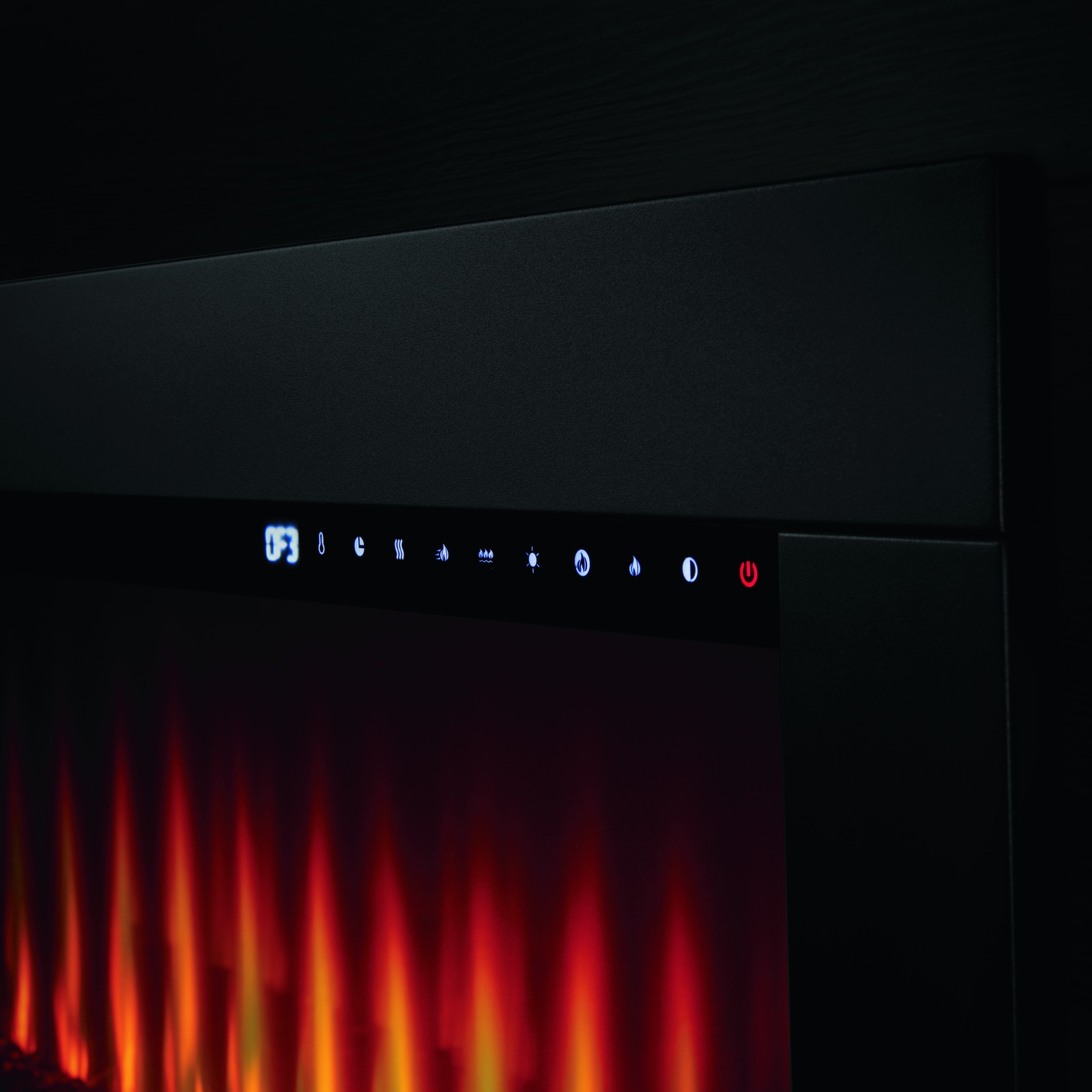 Modern electric fireplace with digital control panel on a black background