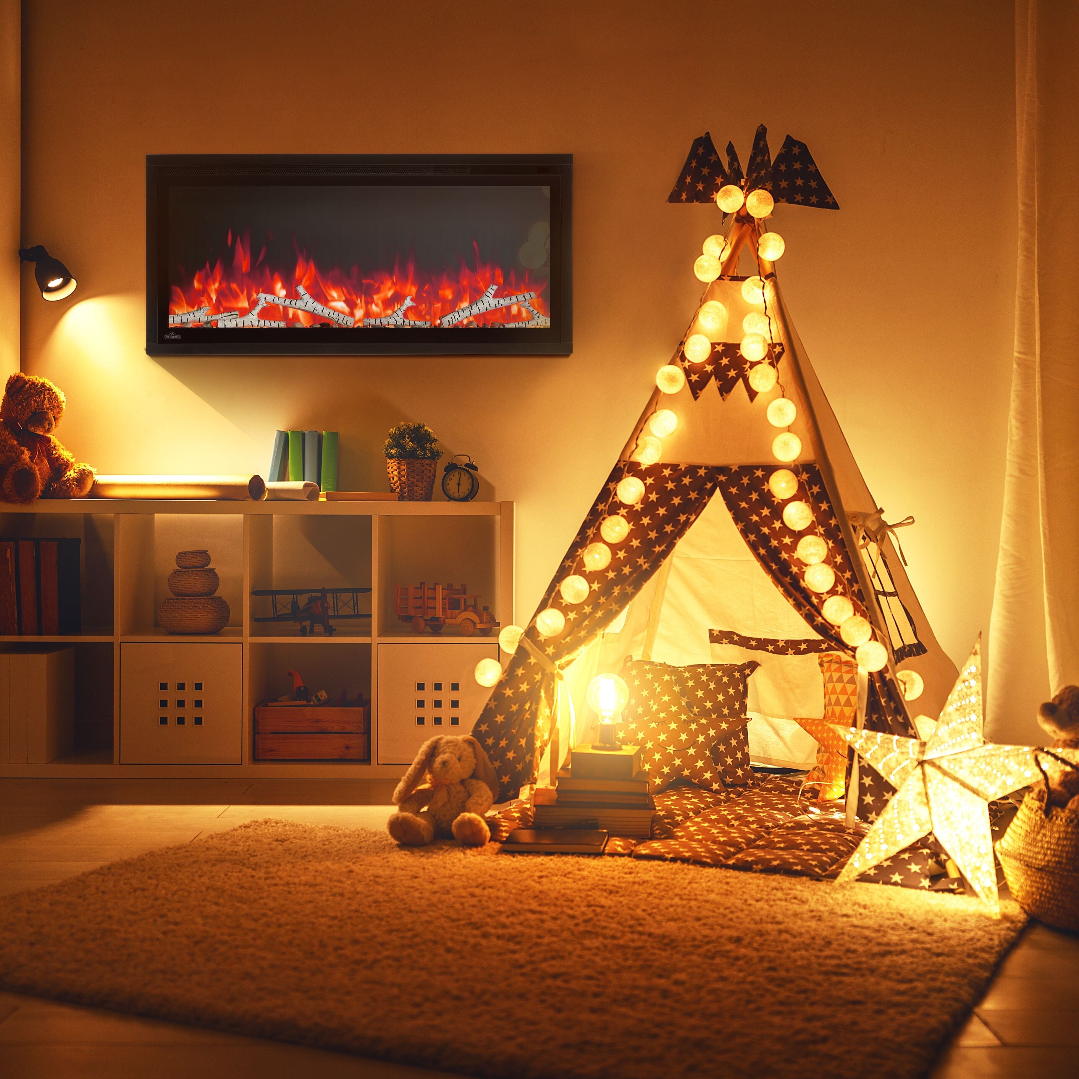 Children's room with a lit teepee, toys, and a fireplace.