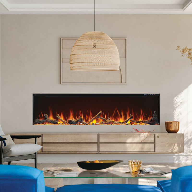 Modern living room with a fireplace, blue sofa, and decorative elements.